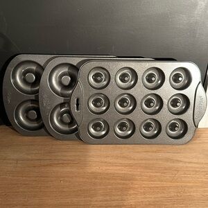 Three heavy duty, donut, baking pans